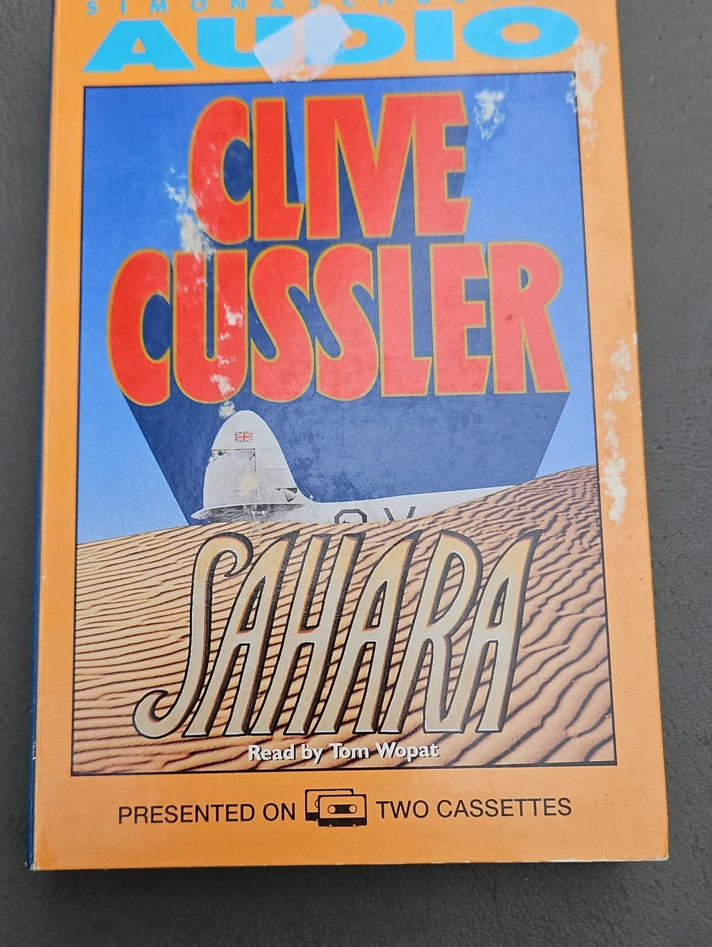 Clive Cussler Sahara Audio Cassette - Orange, Blue